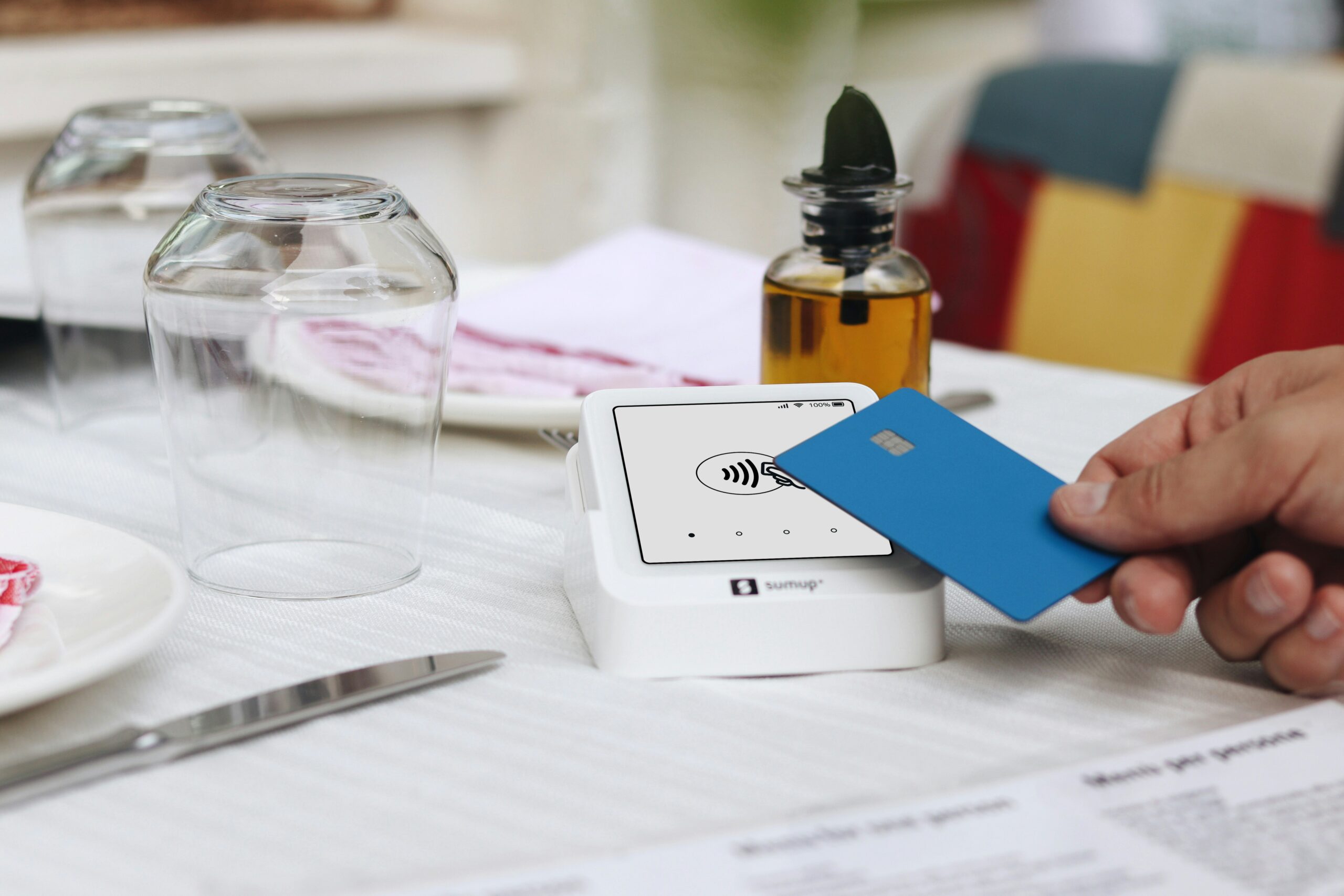 Contactless card payment at a restaurant while traveling abroad